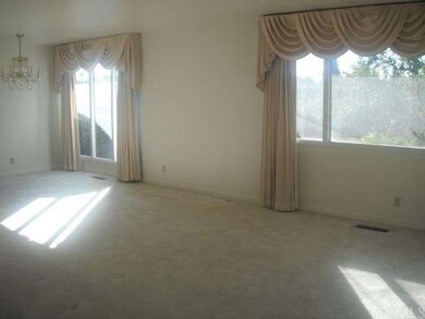 Formal living room and dining area.