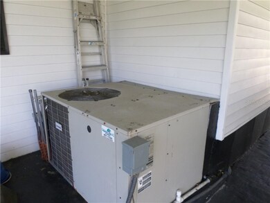 A/C UNIT UNDER ROOF