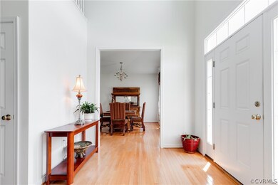 Grand open foyer with chandelier