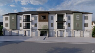 View of building exterior featuring a garage