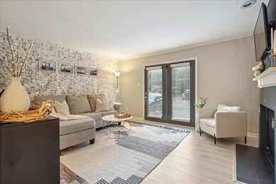 Living room featuring light hardwood / wood-style 