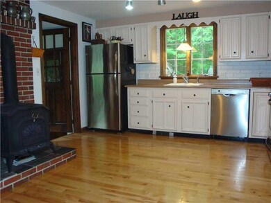 Kitchen. with wood stove and...