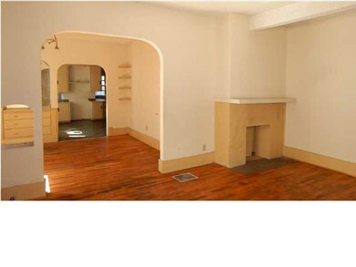 Living Room with view of Dining Room and Kitchen