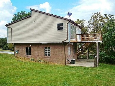 Two tier deck with side steps to yard. Think Big P