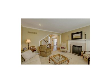 Family room offers a cozy fireplace
