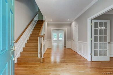 Gorgeous wood floors flow through the first floor.  Dining room is through French doors on the right.