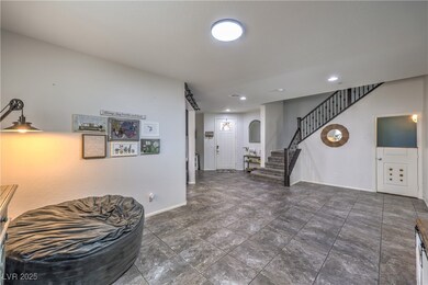 Formal dining room perspective facing front entry,