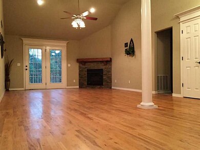 Living Room. hardwood and gas logs !
