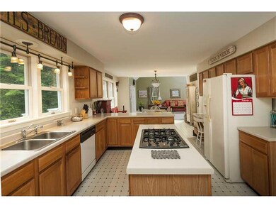 Kitchen. The kitchen has a work desk...