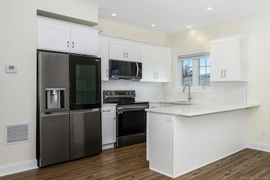 Enjoy relaxing at the breakfast bar in your well a