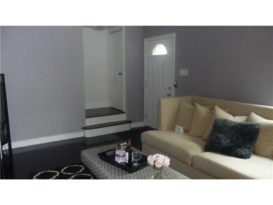 Living Room. Tastefully painted and hardwood floor