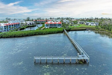 Building on bay with large fishing pier