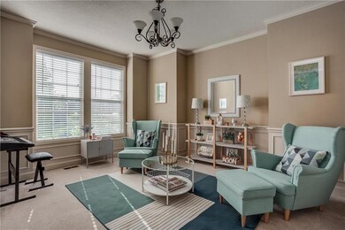 To your left is the flexible formal dining room or