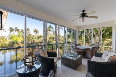 The lanai is enclosed with glass sliding doors.