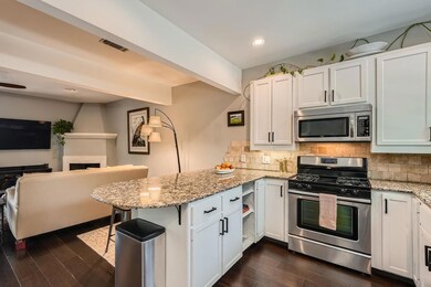 Kitchen featuring appliances with stainless steel