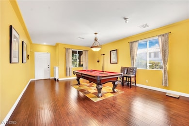 Game room featuring baseboards, visible vents, hardwood / wood-style flooring, and billiards