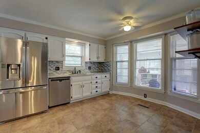 Updated kitchen with quartz stone countertops and 