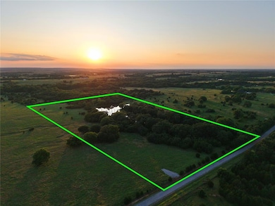 Aerial view of sparsely populated area with property boundaries highlighted