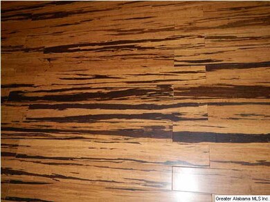 Beautiful Golden Zebra Strand bamboo flooring throughout most of the house