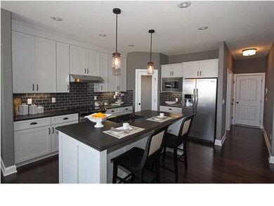 Gorgeous Kitchen Island With Corner Pantry!