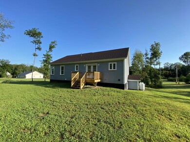 Rear of home with roomy deck