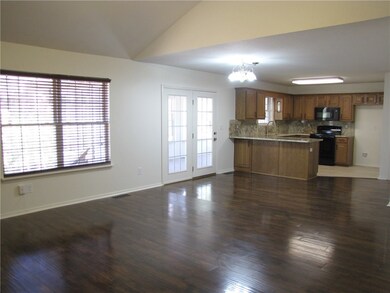 Large living room opens to the kitchen