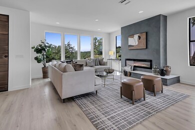 Living area with light wood finished floors, base