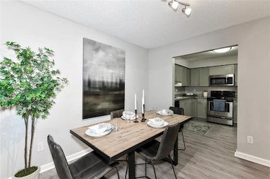 Dining area featuring hardwood / wood-style floors