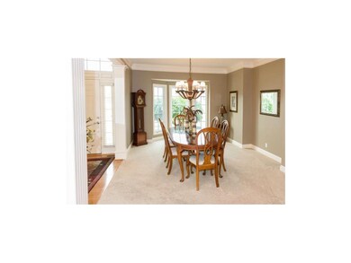 Dining Room featuring 3 bay windows