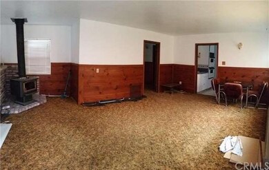 Large living room with wood stove