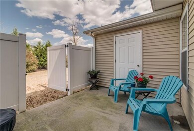 Love the HUGE private patio with storage room!  Has gate (w/ lock) leading out to the green space ----- yes the tree line ---for privacy!  Great area for the pets and kids!!!   