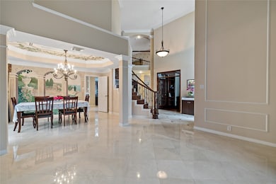 The formal living room is a beautiful space to wel