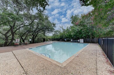 Community pool featuring a patio area