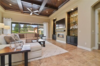 The family room features a beautiful stone accente