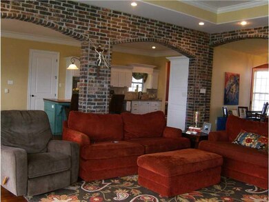 Den/Family/Great Room. Brick archways enhance the 