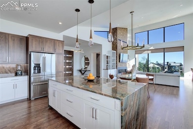 Kitchen opens to the great room, dining area and a