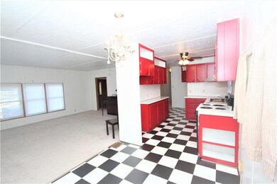 Dining and kitchen combo opens up to the living ro