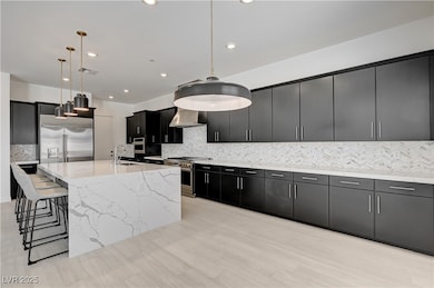 Kitchen with high quality appliances, wall chimney