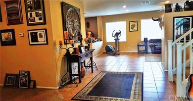Warm and welcoming entry with custom colors and ti