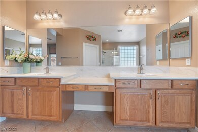 This primary bathroom features a dual-sink vanity