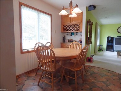 Lovely Dining area in Kitchen with lots of Natural