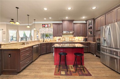The cabinets have custom built pull out shelves, g