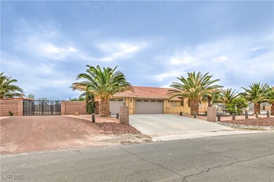 View of front of house with concrete driveway, a g