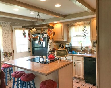 The beautifully updated kitchen feature a large is