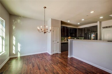 Between the Kitchen and Dining Room features an ov