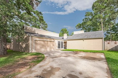 This photo shows a single-story home with a two-ca