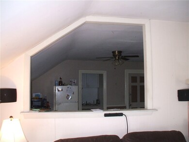 Third floor parlor and kitchen.