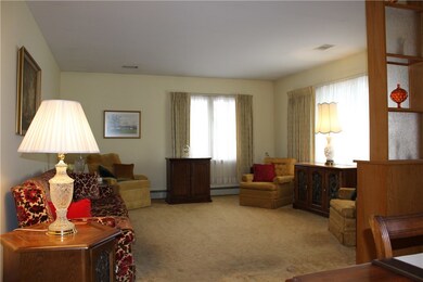 Living room home has hot water heat and central air