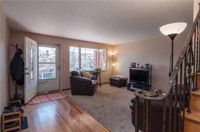 Living room is enlightened by the extensive window