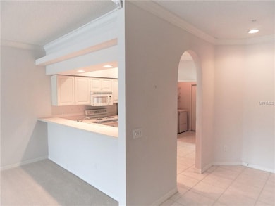 Foyer into kitchen. Counter top entry to kitchen a
